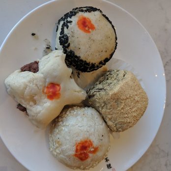 Gou Bu Li - Desserts - clockwise from the top: black sesame, glutinous rice, taro, and red bean - Chinese Near Me - Richmond Hill, Ontario Gou Bu Li - Desserts - clockwise from the top: black sesame, glutinous rice, taro, and red bean - Chinese Near Me - Richmond Hill, Ontario
