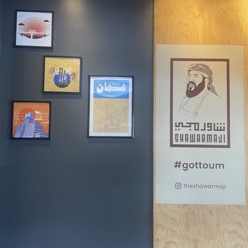 Shawarmaji - Art from Amman, map of Amman, the landmark housing bank building, abstract of the citadel, and the Abdoun bridge. - Middle Eastern Near Me - Oakland, California