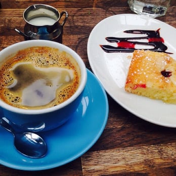 Two Fifty Square - Long black w/ milk and almond cake - Coffee & Tea Near Me - Dublin, D