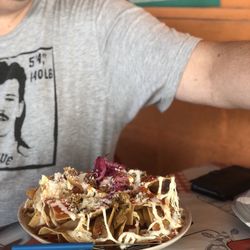 Tuch Tlan - My hubby asked them to throw cochinitas pibil on his chilaquiles. It was life changing.