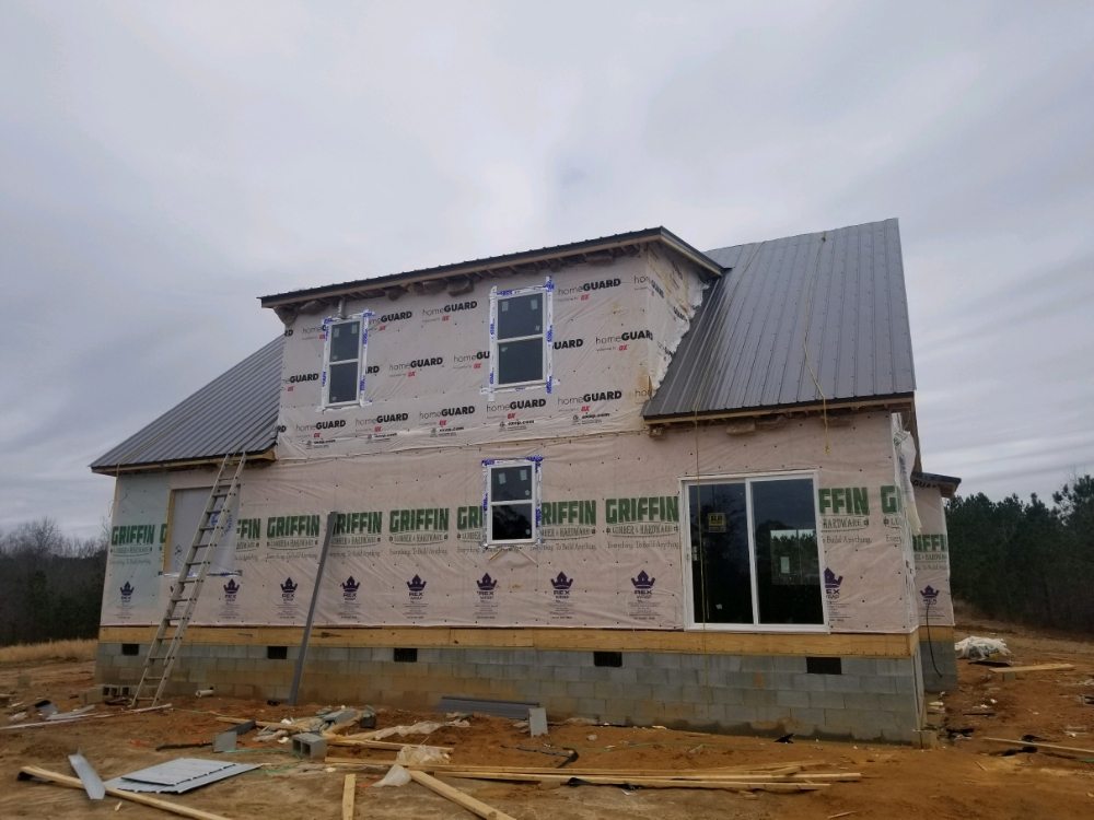 Slide of Longhorns Roofing