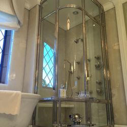 Schicker Luxury Shower Doors, Inc. - Schicker Luxury Shower Doors worked with the architect and homeowner to design this custom shower door.