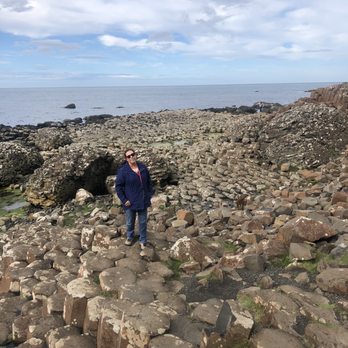 Giant's Causeway - Nancy on the causeway stones. - Landmarks & Historical Buildings Near Me - Bushmills, MYL