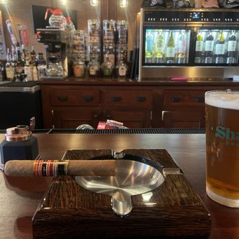 Rigby's Cigars & Lounge - a cigar and a glass of beer - Cigar Bars Near Me - Paris, Texas