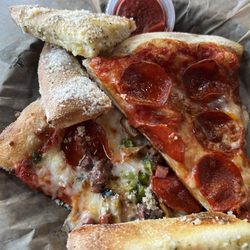 Mamma Mineo's Pizza - 2 slices of pizza, 4 breadsticks and a soda!