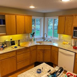 Unity Services Painting & More - The before of a cabinet refinish