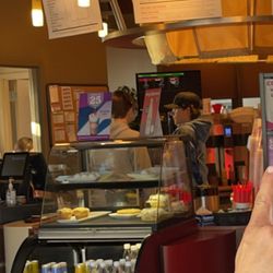 Scooter's Coffee - Random people behind the drink counter, wearing the drive thru headset