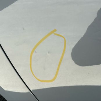Dent Evo - This is the indent on my driver door  There is a crack in the paint - Mobile Dent Repair Near Me - Upland, California