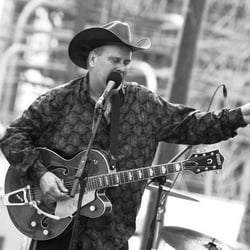 Cooter Browns - Tim Wooley : lead vocals , guitar and harmonica