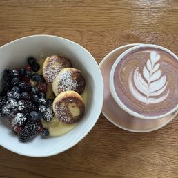 Sirniki with custard and fruit. Dirty Ube. Sirniki with custard and fruit. Dirty Ube.