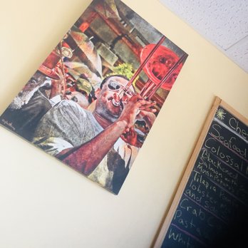 The Kitchen - a picture of a man eating a sandwich - Cajun/Creole Near Me - New Orleans, Louisiana The Kitchen - a picture of a man eating a sandwich - Cajun/Creole Near Me - New Orleans, Louisiana