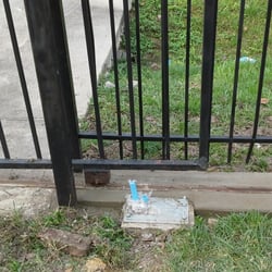 Elite Masonry and Concrete - Close-up of addition meeting the existing driveway. It's perfectly level. also raised the gate motor foundation.