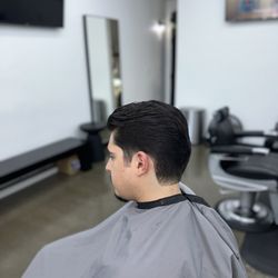 Solano Ave Barber Shop - Classic slicked back/ cut by Denyll
