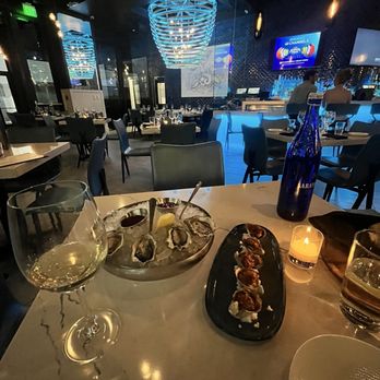 Salt Water Social - Oyster on a Half Shell* - Seafood Near Me - Denver, Colorado Salt Water Social - Oyster on a Half Shell* - Seafood Near Me - Denver, Colorado