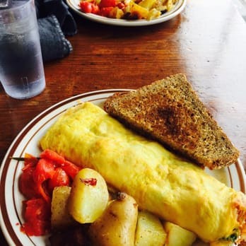 On Orange - Western omelette + ham with potatoes and roasted tomatoes - New American Near Me - Lancaster, Pennsylvania On Orange - Western omelette + ham with potatoes and roasted tomatoes - New American Near Me - Lancaster, Pennsylvania