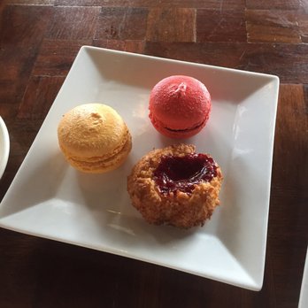Amelie’s - Orange marmalade macaron, raspberry macaron, and coconut cranberry thumbprint cookie. All gluten- and dairy-free. - Cafes Near Me - Charlotte, North Carolina Amelie’s - Orange marmalade macaron, raspberry macaron, and coconut cranberry thumbprint cookie. All gluten- and dairy-free. - Cafes Near Me - Charlotte, North Carolina