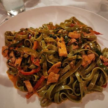 Montage - a plate of pasta with meat and vegetables - Wine Bars Near Me - Cedar Falls, Iowa