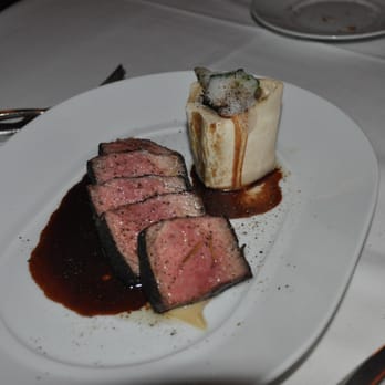 Spago - New York Steak with mushroom stuffed bone marrow - New American Near Me - Beverly Hills, California Spago - New York Steak with mushroom stuffed bone marrow - New American Near Me - Beverly Hills, California
