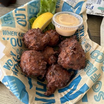 The Fish Joint - COUNCH FRITTER - Seafood Near Me - Coconut Creek, Florida The Fish Joint - COUNCH FRITTER - Seafood Near Me - Coconut Creek, Florida
