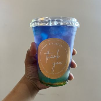 Sips & Scoops Handcrafted Coffee - Butterfly Mango Tea w/ heart shaped jelly - Coffee & Tea Near Me - Sacramento, California Sips & Scoops Handcrafted Coffee - Butterfly Mango Tea w/ heart shaped jelly - Coffee & Tea Near Me - Sacramento, California