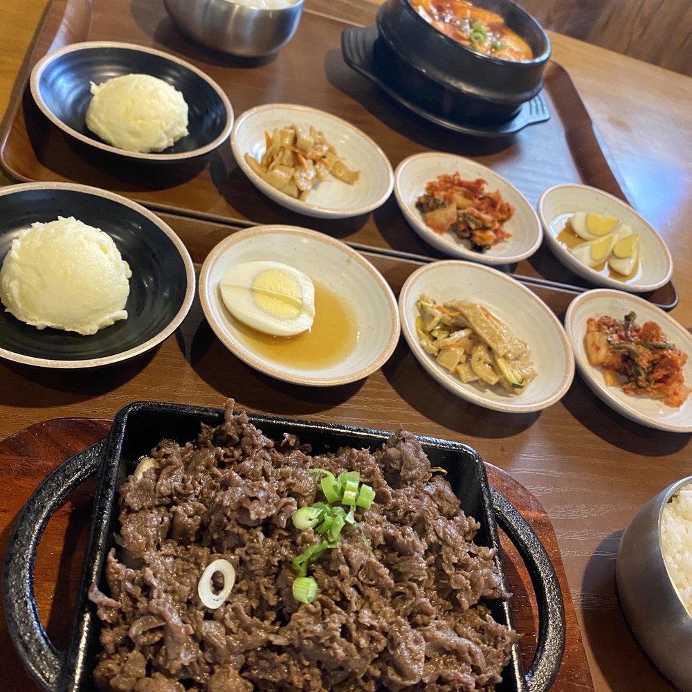 Jan Chi Korean Cuisine & BBQ - Top: Seafood Tofu Soup Bottom: Bulgogi - Korean Near Me - Austin, Texas Jan Chi Korean Cuisine & BBQ - Top: Seafood Tofu Soup Bottom: Bulgogi - Korean Near Me - Austin, Texas