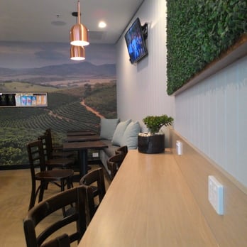 Naked Coffee - The breakfast bar with powerpoints!! Gorgeous wall print too. - Cafes Near Me - Brisbane, QLD