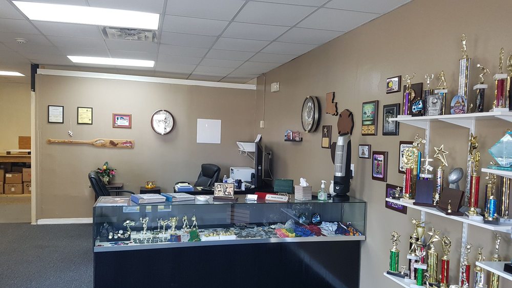 AWARDS UNLIMITED Updated July 2024 700 W Judge Perez Dr, Chalmette