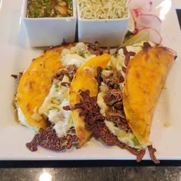 Berrian Quesa Tacos with a dipping sauce. Extraordinary!