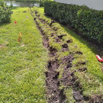 Bayko Irrigation - a man working in the yard - Irrigation Near Me - Bradenton, Florida