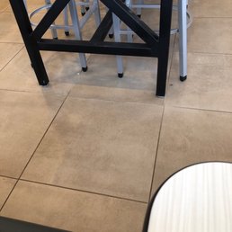 Food debris under most tables.