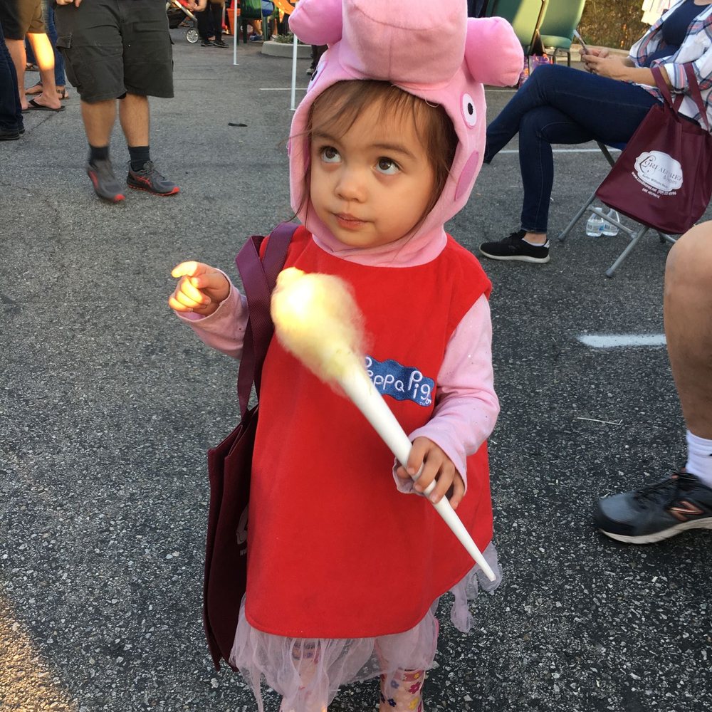 Foothill Vineyard Church - My daughter eating cotton candy at FVC harvest celebration - Churches Near Me - San Dimas, California