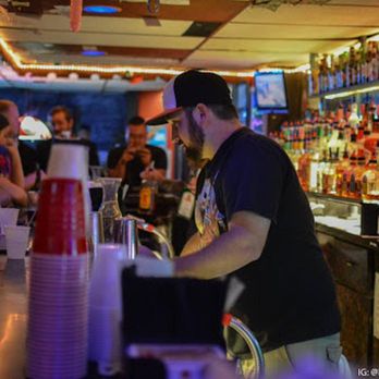 The Stop - a man standing at a bar - Dive Bars Near Me - Wichita, Kansas The Stop - a man standing at a bar - Dive Bars Near Me - Wichita, Kansas