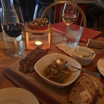Wild Olive - Warm bread and seasonal topping and warm olives - Italian Near Me - Johns Island, South Carolina Wild Olive - Warm bread and seasonal topping and warm olives - Italian Near Me - Johns Island, South Carolina