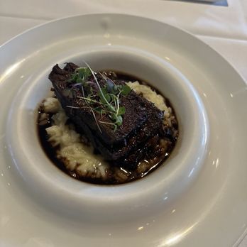 Marfil Bistro - Smoked short rib risotto - Breakfast & Brunch Near Me - Doral, Florida Marfil Bistro - Smoked short rib risotto - Breakfast & Brunch Near Me - Doral, Florida