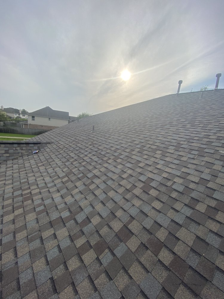 Slide of Big Randys Roofing