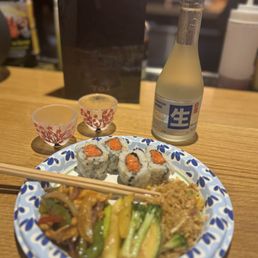 Sake, spicy tuna roll, veggies, rice Sake, spicy tuna roll, veggies, rice