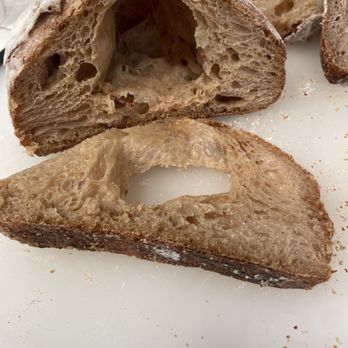 boulangerie - Paid $7 for a bread and can't even make a sandwich with it, due to a big hole in the middle of it - French Near Me - Newport Beach, California