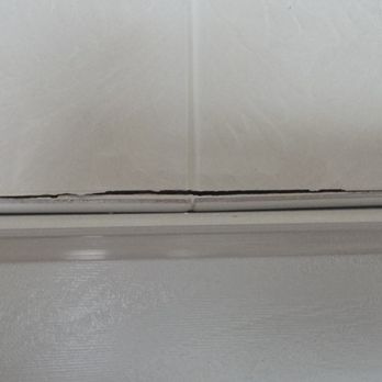 Renuity Home Improvement of South Florida - Damaged MB Window Tile - General Contractors Near Me - Fort Lauderdale, Florida