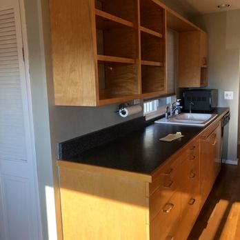 Infinity Design and Build - BEFORE: dark counterops - General Contractors Near Me - San Diego, California