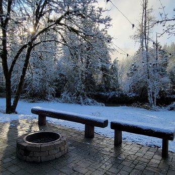 Firewater Lodge - Porch overlooking the year-round Tenmile Creek - Hotels Near Me - Roseburg, Oregon Firewater Lodge - Porch overlooking the year-round Tenmile Creek - Hotels Near Me - Roseburg, Oregon