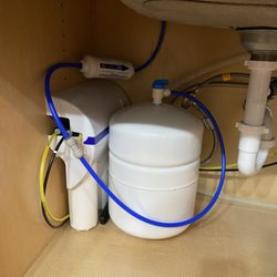 Remarkable Water Solutions - Install picture of a Reverse Osmosis Drinking Water System.