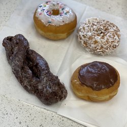 Sunshine Bagel - Chocolate Crueller, Boston Cream, Vanilla Sprinkle, Coconut Donuts - Cake  Yeast here