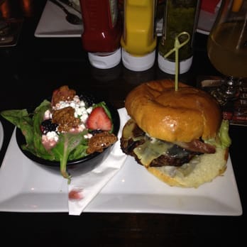Mill Street Beer Hall - Cheddar Stout burger with a spinach & strawberry salad - Gastropubs Near Me - Toronto, Ontario Mill Street Beer Hall - Cheddar Stout burger with a spinach & strawberry salad - Gastropubs Near Me - Toronto, Ontario