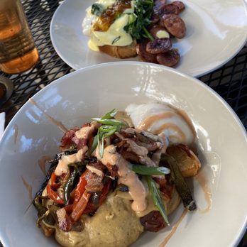 Sea Wolf Tybee - Front: poutine Back: Duck Benedict both 10/10 dishes - Wine Bars Near Me - Tybee Island, Georgia Sea Wolf Tybee - Front: poutine Back: Duck Benedict both 10/10 dishes - Wine Bars Near Me - Tybee Island, Georgia
