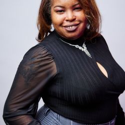 Massage by Monique - Empowerment Embodied: Monique Jenkins, Exemplifying Strength and Elegance in Business.