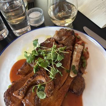 Noble Crown - The paprika glazed pork steak. Very tender (could cut with a fork) and super flavorful. The fava bean puree was a perfect complement. - New American Near Me - St. Louis, Missouri Noble Crown - The paprika glazed pork steak. Very tender (could cut with a fork) and super flavorful. The fava bean puree was a perfect complement. - New American Near Me - St. Louis, Missouri