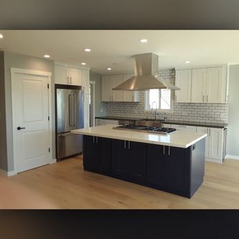 Select Tile & Stone - Quartz countertops with subway patten tile - General Contractors Near Me