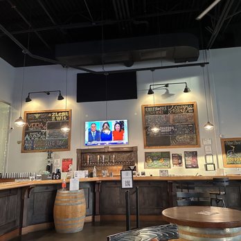 Solace Brewing Company - a bar with tvs and a television - Breweries Near Me - Sterling, Virginia Solace Brewing Company - a bar with tvs and a television - Breweries Near Me - Sterling, Virginia