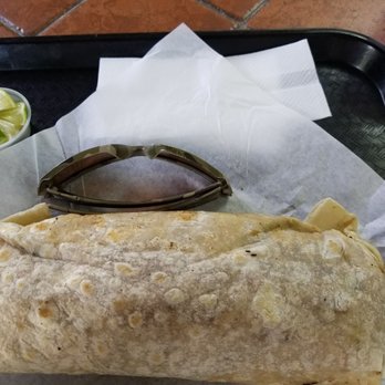 Cotija's Taco Shop - Huge California Burrito, those are my Oakley Fuel Cells next to it. - Mexican Near Me - Colton, California