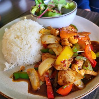 Thai Basil - Chicken Cashew Nuts w/rice & salad $11.50 (Chicken breast wok fried with peppers, carrots, onions, mushrooms in medium spiced chili-oil sauc - Thai Near Me - Vancouver, British Columbia Thai Basil - Chicken Cashew Nuts w/rice & salad $11.50 (Chicken breast wok fried with peppers, carrots, onions, mushrooms in medium spiced chili-oil sauc - Thai Near Me - Vancouver, British Columbia